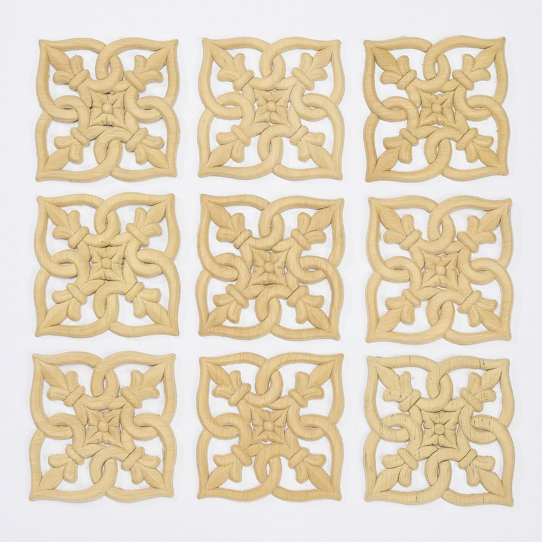 (9) Italian pierce carved rosette appliques, 4": Group of (9) Italian pierce carved appliques, each of stylized rosette form, ready for your own stained or painted finish, 4" square.