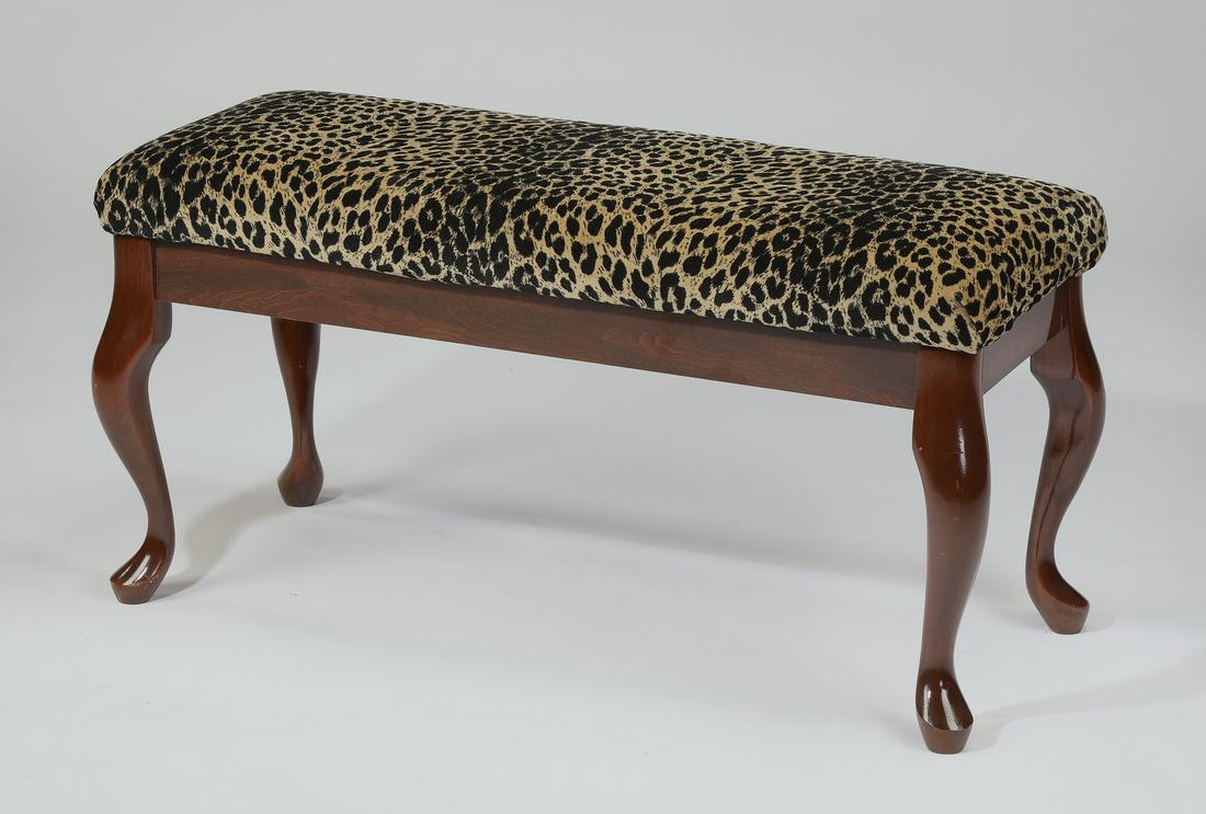 Leopard print velvet and mahogany bench, 37"l: Leopard print velvet and mahogany bench, having a rectangular upholstered seat rising on carved mahogany cabriole legs, 19"h x 37"l x 15.5"w.