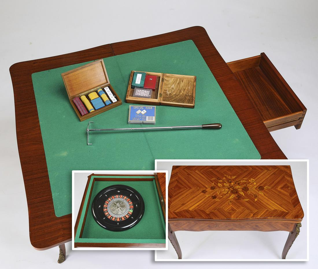 Early 20th c. French marquetry inlaid game table: French Louis XV style bronze and satinwood marquetry games table, early 20th century, having a marquetry inlaid surface with bronze mounts opening to a green felt playing surface, concealing a lower s