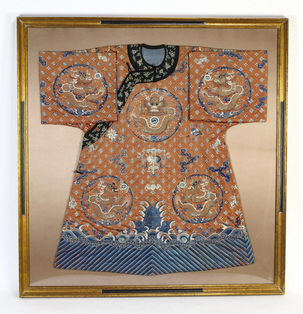 Framed Chinese silk embroidered dragon robe, 54"h: Chinese dragon robe, executed in silk with silk embroidery and gold couching, decorated with dragon roundels depicting five clawed writhing dragons contesting pearls of wisdom amidst auspicious cloud 