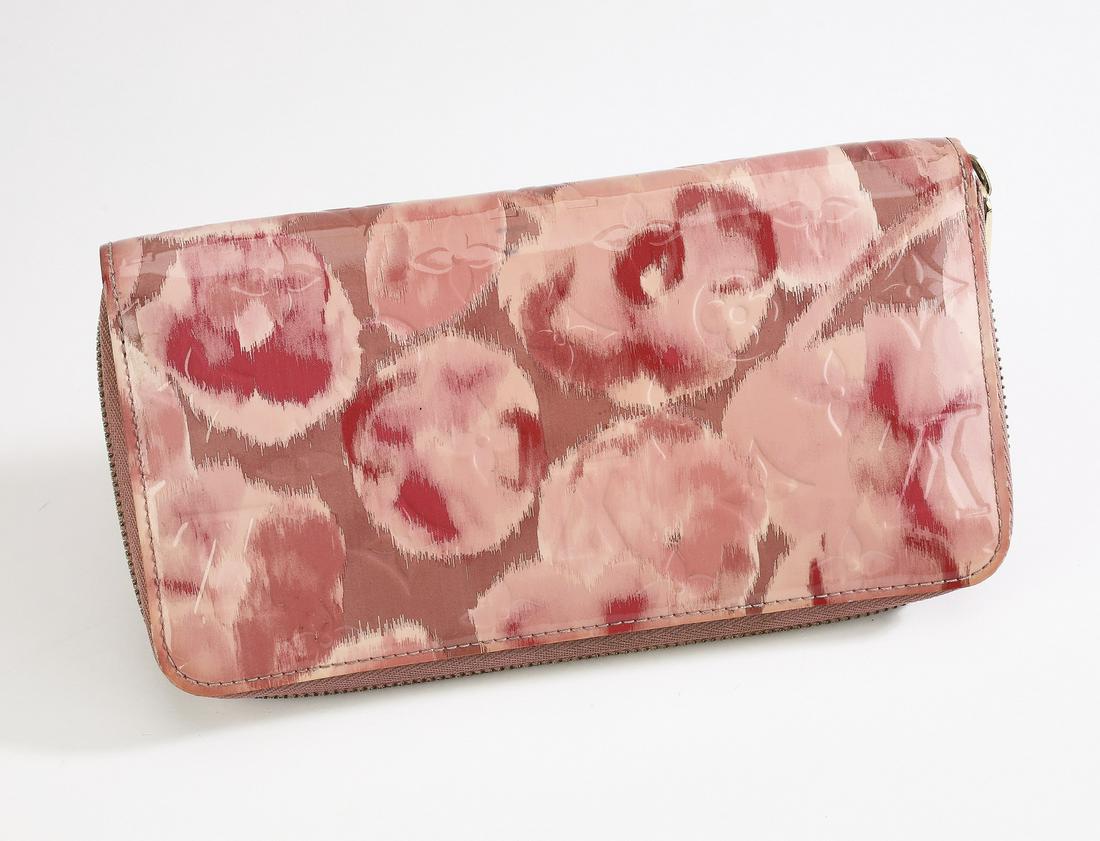 Authentic Louis Vuitton Monogram Zippy Floral Wallet: Authentic Louis Vuitton Monogram Vernis Zippy Floral Wallet, in pink and beige with gold-tone hardware, the snap closure opening to a pink leather interior fitted with eight card slots, six bill compa