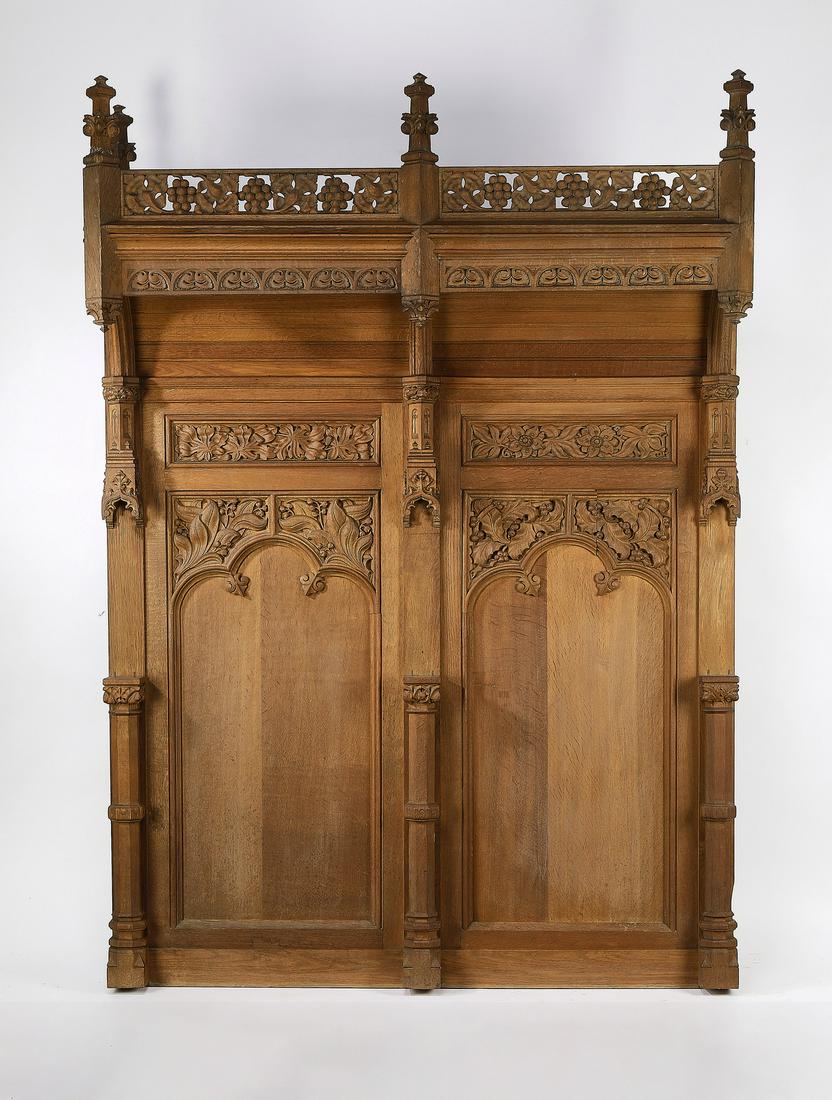 19th c. French Gothic Revival carved oak panels: 19th century French Gothic Revival carved oak panels, having a pierce carved gallery depicting grapevines interspersed by spires with foliate crockets, rising over the mansard canopy, above the back c
