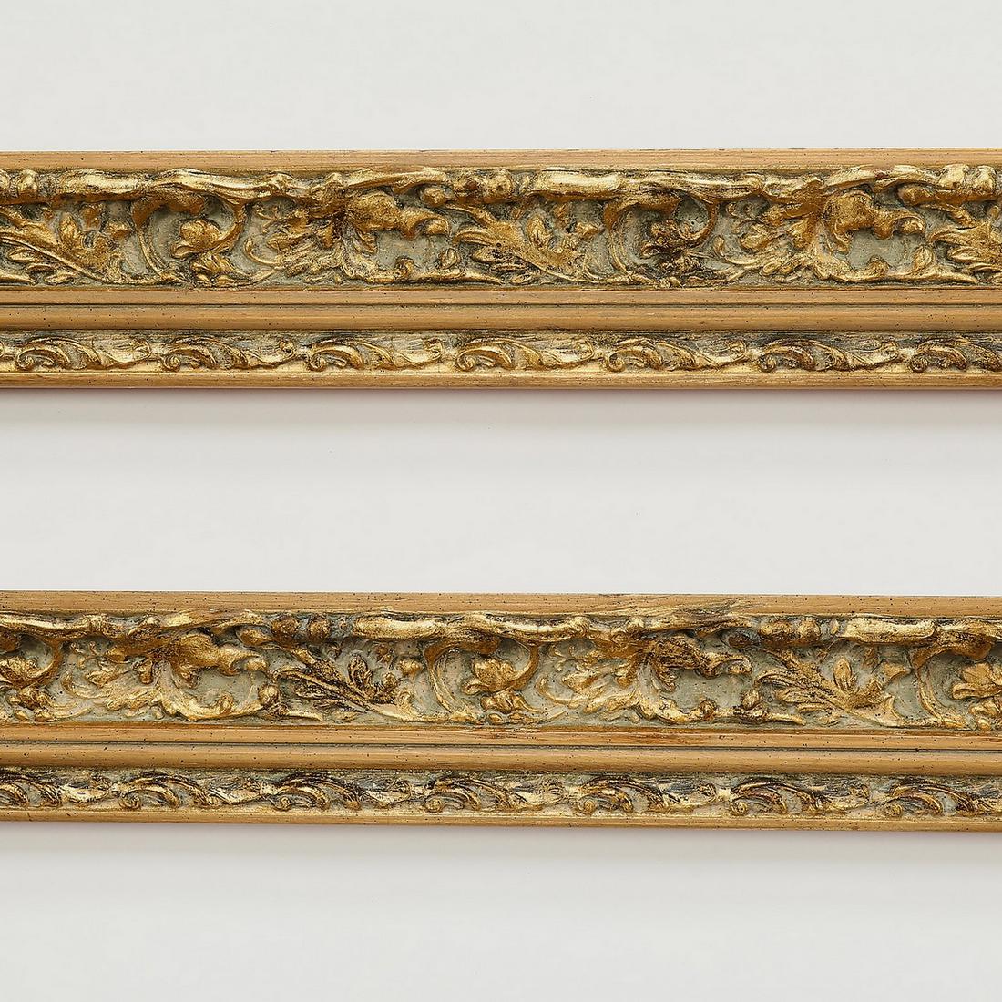 (2) Italian carved and gilt decorative moldings 119"l: Pair of Italian carved and gilt decorative moldings, each with a major and minor border of foliates, measuring 3.75"h x 118.5"l x 2.25"d.