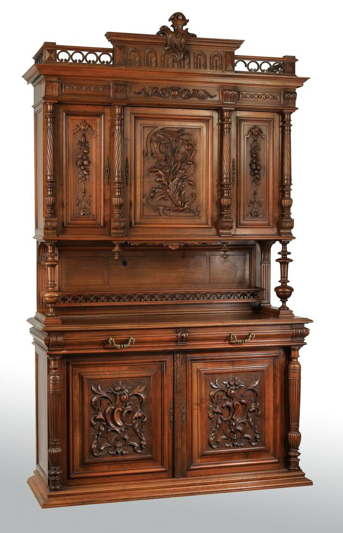 19th c, French carved walnut buffet, 91"h: French Rococo Revival carved walnut buffet, 19th century, centering a foliate finial flanked by a carved and pierced gallery, above a molded crest and frieze centering a relief carved cabochon and scr