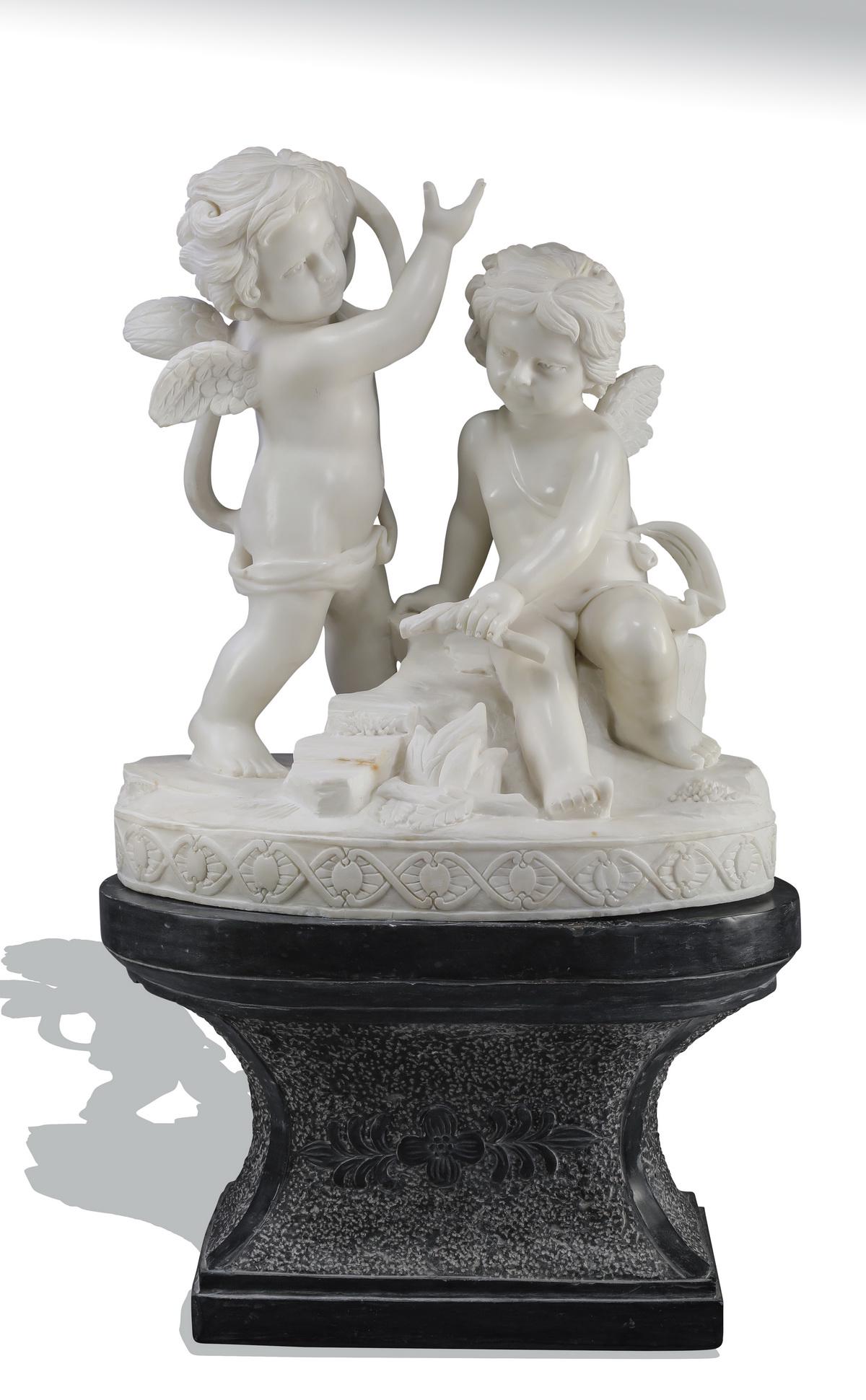 Carved marble sculpture of two winged putti (1 of 4)