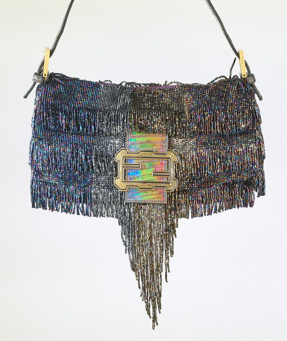 Authentic Limited Edition Fendi beaded baguette: Authentic Limited Edition Fendi beaded baguette, having an irridescent snakeskin adjustable flat strap and gold-tone hardware, the Western style logo closure opening to the yellow satin interior with 