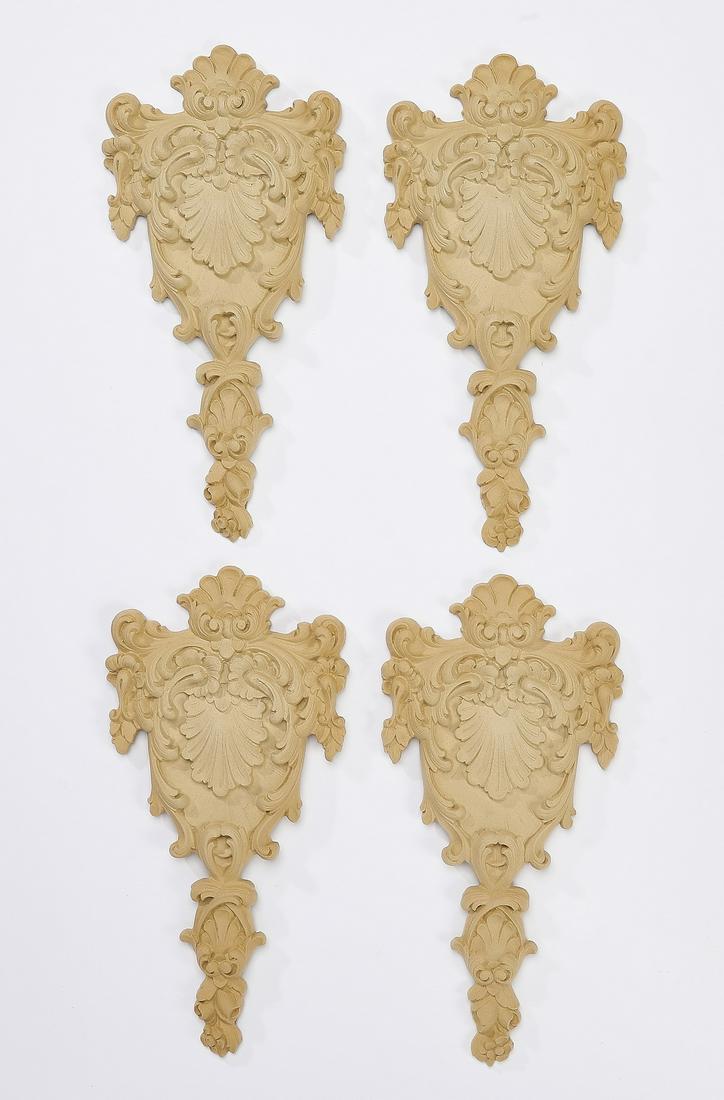 (4) Continental wood foliate and shell appliques: Group of (4) Continental wood appliques, each having foliate shields centering shell motifs, ready for your stained or painted finish, 11.25"h x 5.5"w x 0.5"d.