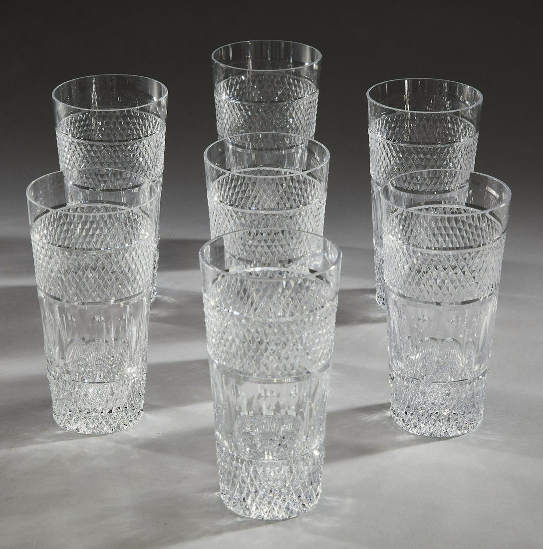 (7) Continental cut crystal iced tea glasses: (7) Continental cut crystal iced tea glasses, executed in clear crystal of cylindrical tumbler form, each having a band of diamond cuts surmounting a band of oval thumb prints, over another band of di