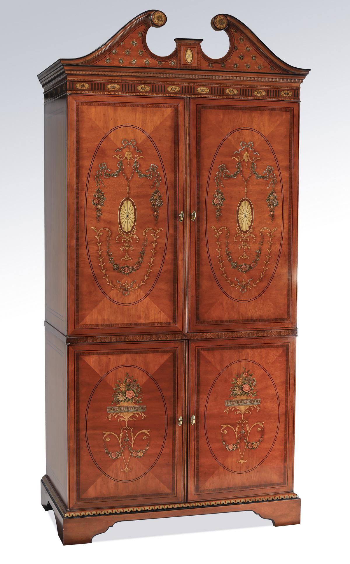 Drexel Heritage parquetry inlaid mahogany armoire: Drexel Heritage Neoclassical style parquetry inlaid mahogany armoire, having a broken arch pediment above four doors decorated with oval paterae and polychrome swags and garlands, opening to compartme