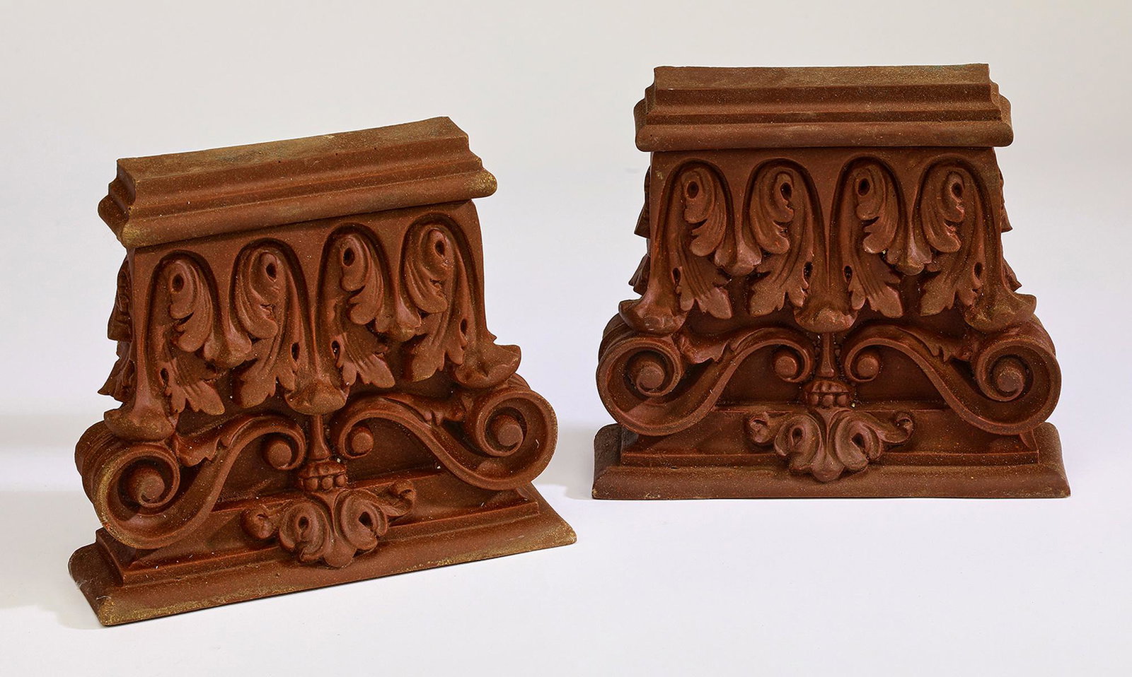 (2) Cast composite Corinthian capital corbels, 8.25"w: Pair of Corinthian capital corbels, each with acanthus leaf and scrollwork decoration, crafted of cast composite, ready for your stained or painted finish, 7.5"h x 8.25"w x 2.5"d.