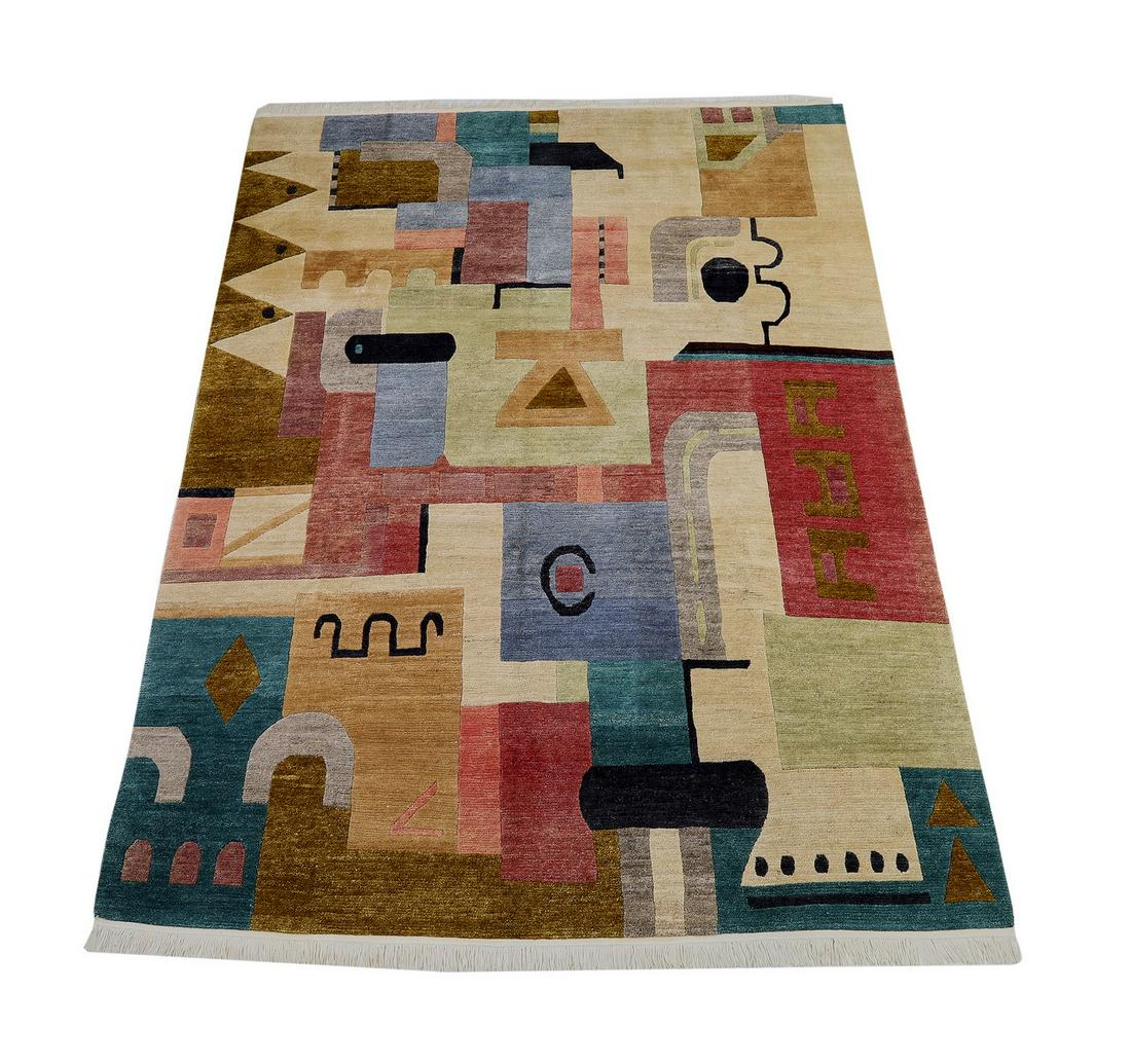 Nepalese hand knotted wool carpet 12 x 9: Nepalese hand knotted wool Contemporary carpet, having an abstract architectonic design in teal, tan, pale green, slate blue, peach, black, mustard, and rose, 12' 1"l x 9' 1"w.