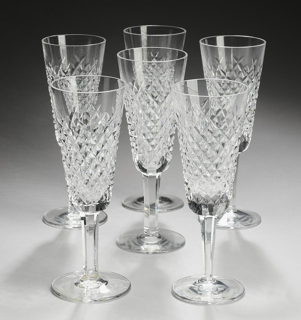 (6) Waterford Alana crystal champagne flutes: Set of (6) Waterford crystal champagne flutes in the Alana pattern, each bowl having a cut cross hatch pattern, rising on a faceted stem and resting on a circular foot, maker marked, 7.25"h.