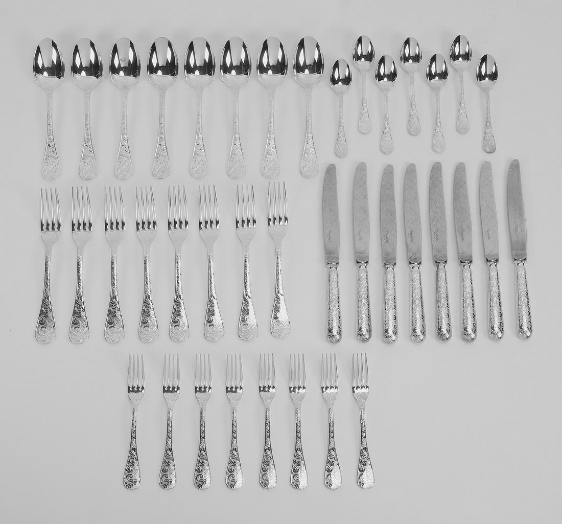 Christofle silver plated Jardin D'Eden flatware: Group of (39) pieces of Christofle silver plated flatware, in the Jardin D'Eden pattern, including (8) knives, 9.5"l, (8) dinner forks, 8"l, (8) salad forks, 6.75"l, (8) tablespoons, 7.5"l, and (7) te