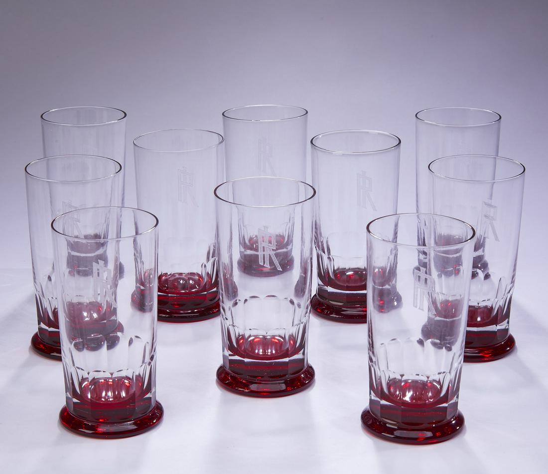(10) Clear and ruby glass monogrammed tumblers: (10) Clear and ruby glass tumblers, the upper part of each executed in clear glass, monogrammed with an etched ‘RP,’ the bottom of each executed in a red glass with a faceted circular base, 5.25"h