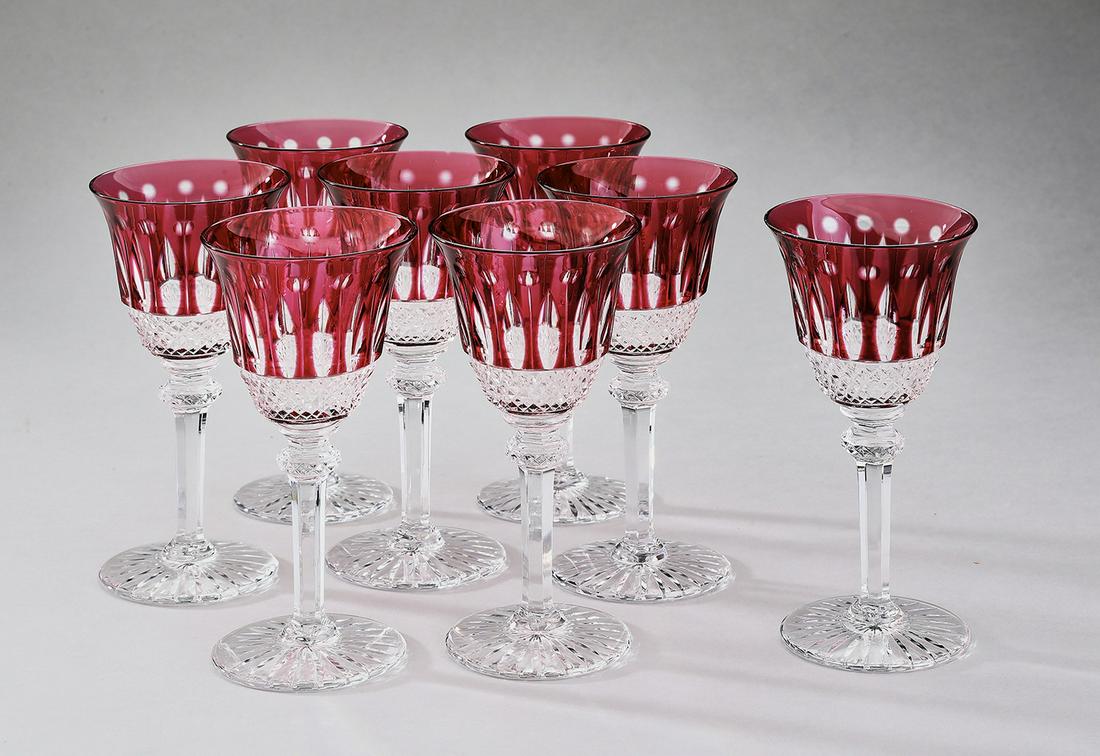 (8) St. Louis ruby cut to clear crystal wine glasses: (8) St. Louis (France) ruby cut to clear crystal wine glasses in the 'Tommy' pattern, each having a bell shaped bowl cut with repeating stylized flowers, tapering to plain diamond cuts, over an orname