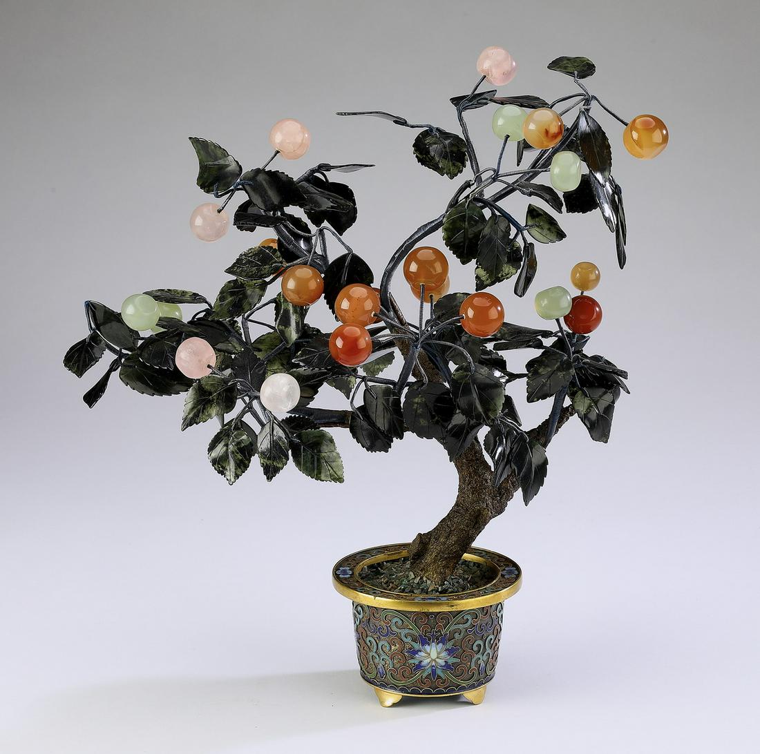 Chinese jade bonsai cherry tree w/ cloisonne pot: Chinese jade and semi-precious stone bonsai cherry tree, the cherries carved from jade, carnelian, and rose quartz, the whole rising from a cloisonne enamel pot decorated with lotus scrollwork, 13"h x