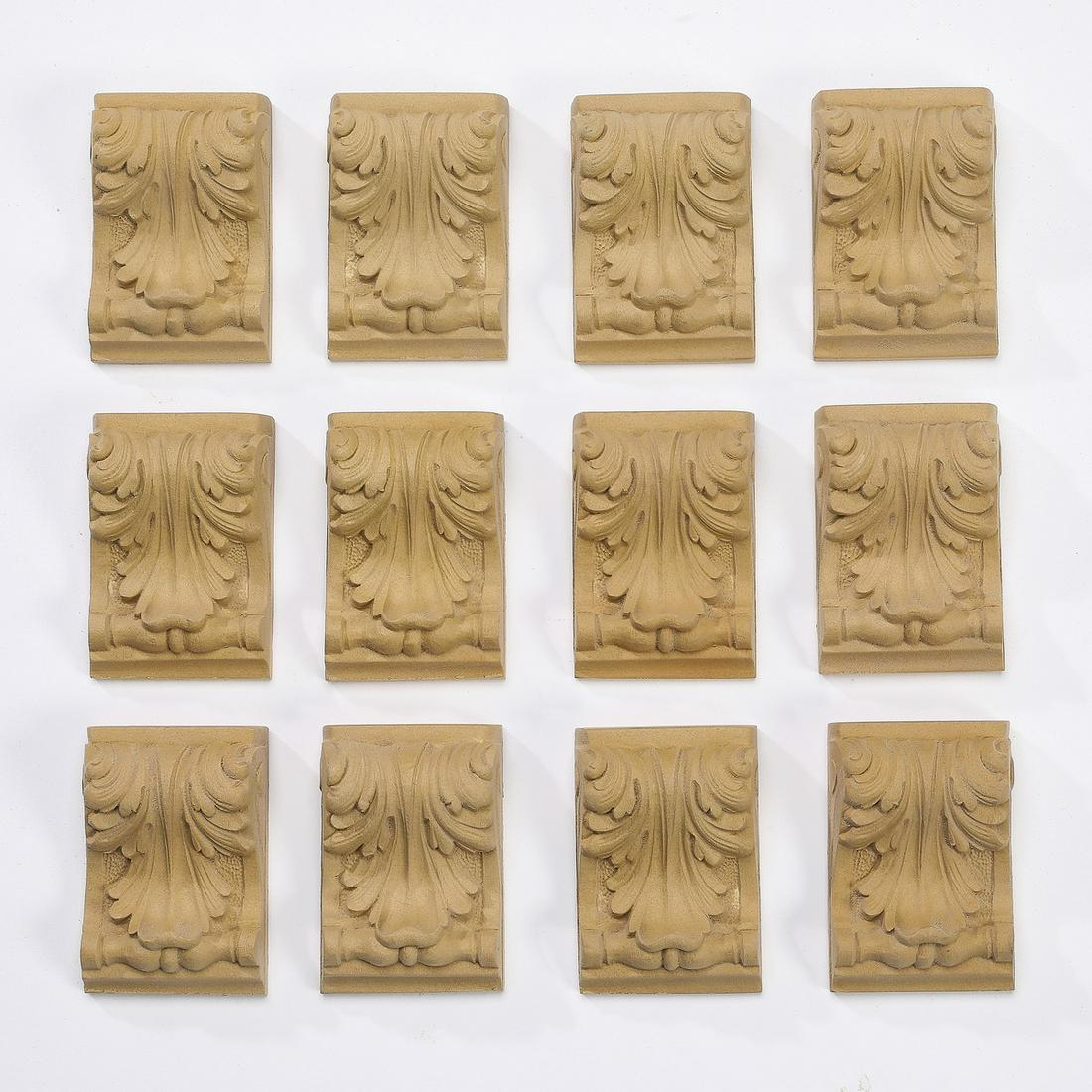 (12) Carved wood acanthus leaf appliques, 4"h: Group of (12) carved wood appliques, each of acanthus leaf form, ready for your stained or painted finish, 3.75"h x 2.5"w x 1.5"d.