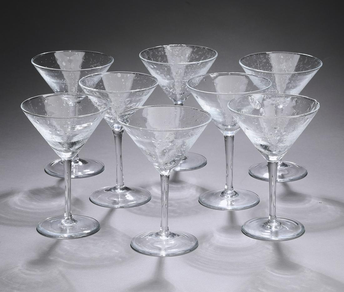 (8) Italian 'Bellini' martini glasses: (8) Italian hand blown clear bubble glass martini glasses, from the Bellini collection by Mariposa, each having a polished pontil mark, 6.25"h x 4.25"dia