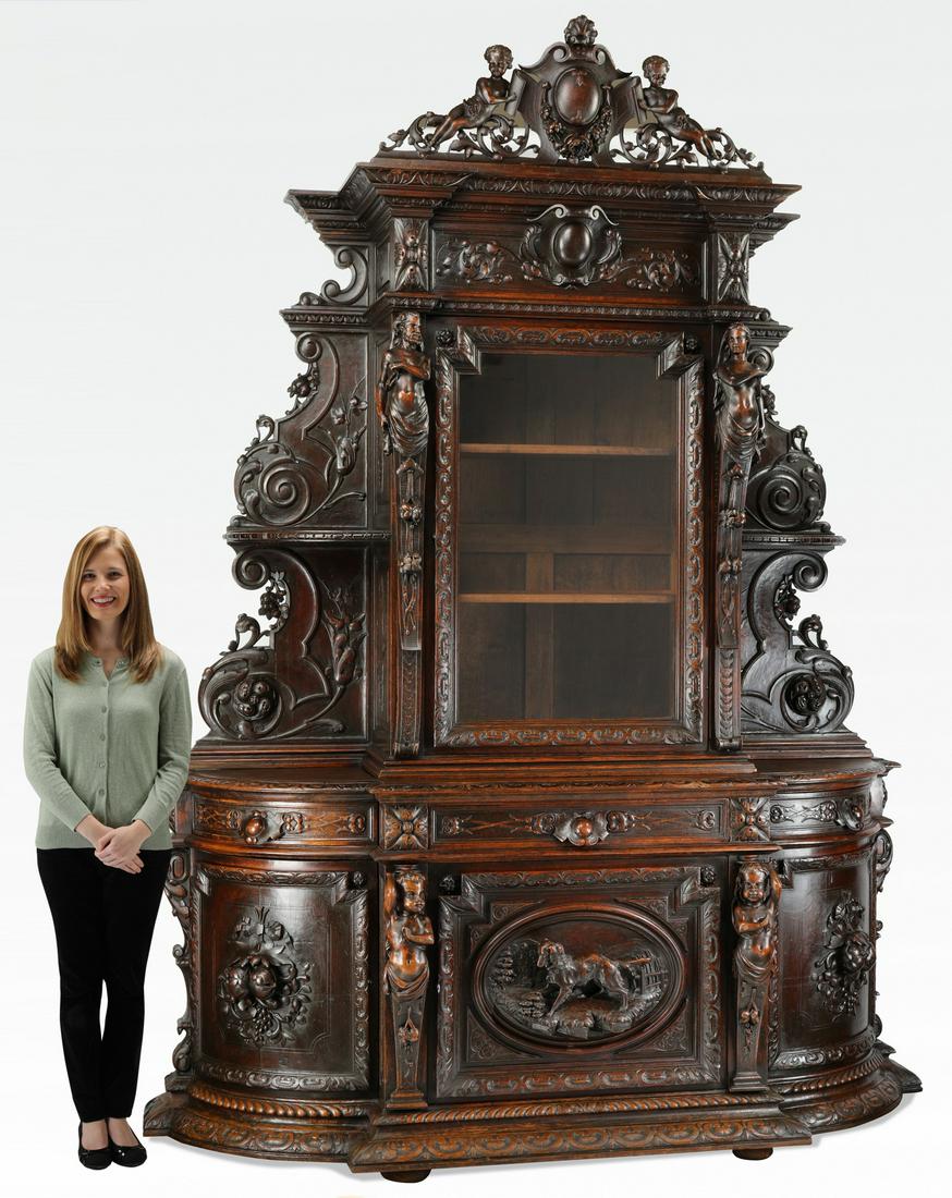 19th c. French carved oak buffet du chasse: French carved oak buffet du chasse, late 19th century, having a pierced crest centering a shell topped cabochon flanked by putti and acanthus scrollwork, above a molded cornice and foliate cabochon fr