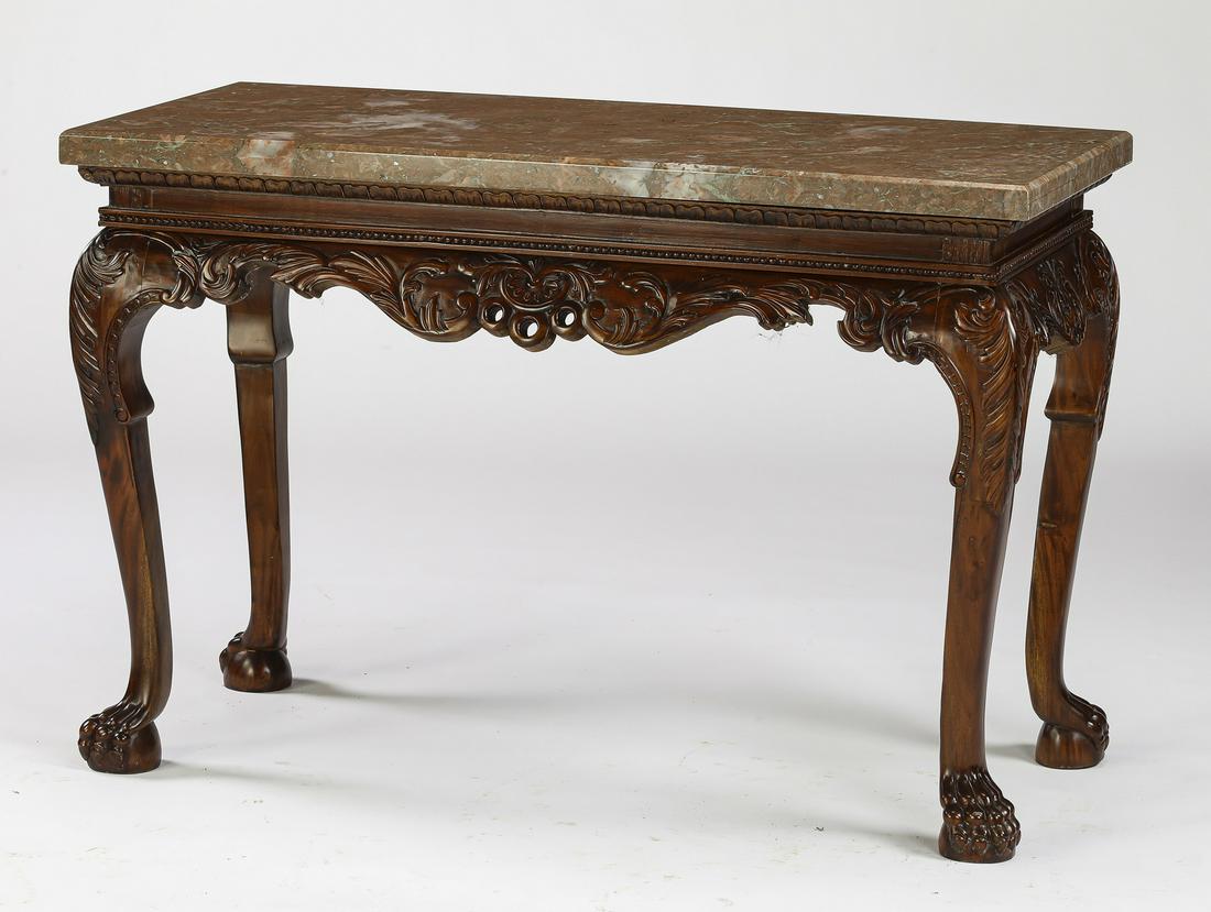 Chippendale style mahogany marble top console, 49"w: Chippendale style marble and mahogany console, having a marble surface in hues of pink, gray and white, rising on a pierced and carved apron and cabriole legs, the knees carved with acanthus, terminat