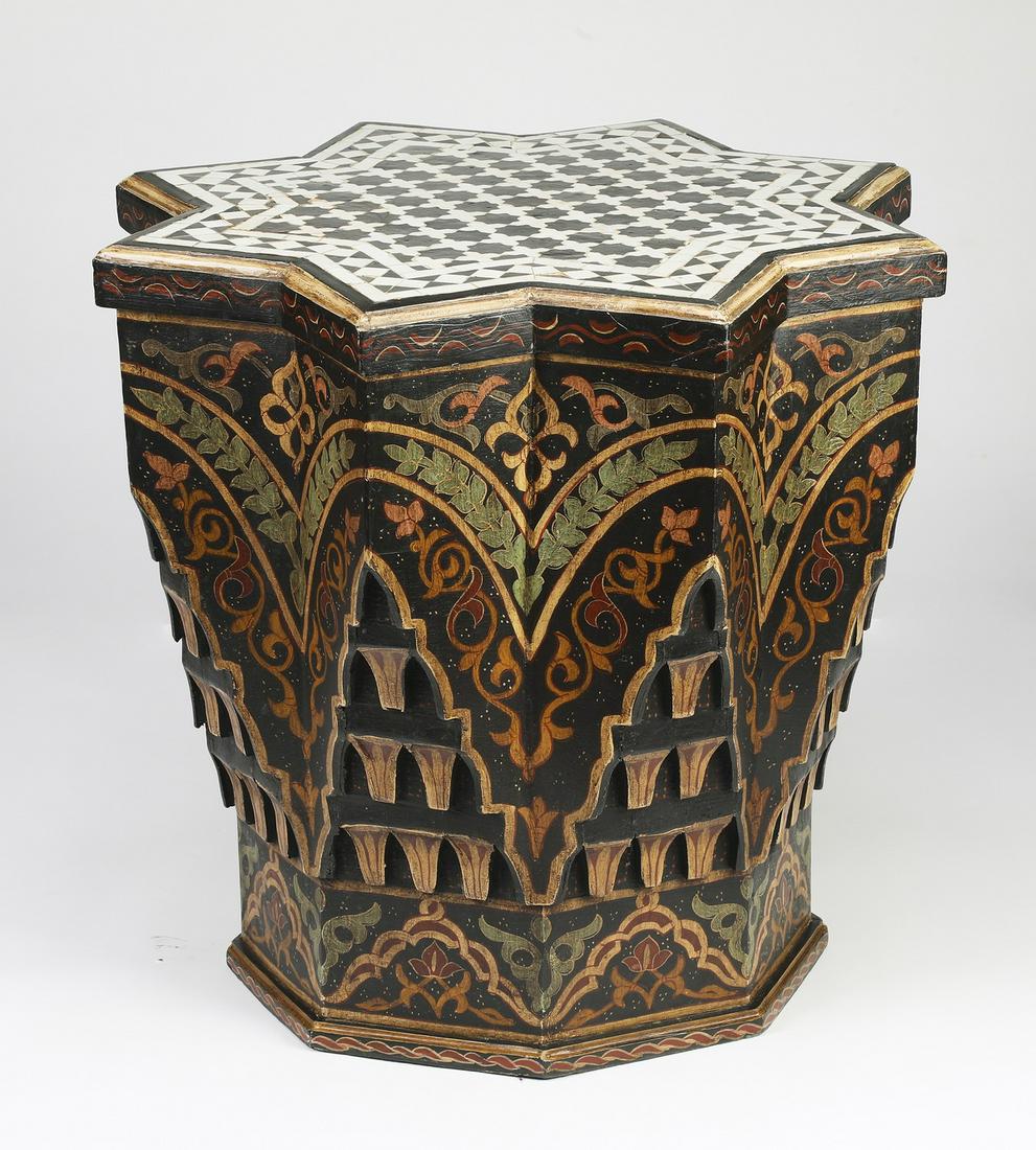 Moorish style mosaic top occasional table: Moorish style mosaic occasional table, in the form of an eight point star, the surface inlaid with black and white star mosaic tiles, rising on the conforming base, carved and paint-decorated with scr