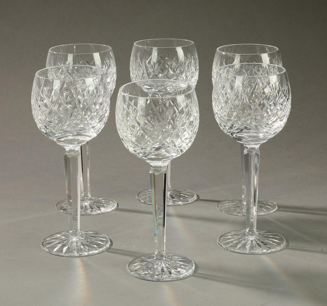 (6) Waterford Donegal pattern wine hock glasses: Group of (6) Waterford 'Donegal' pattern wine hock glasses, each having a lattice cut design and tapered standard terminating to a cut foot, maker marked to underside, 7.5"h x 2.75"dia.
