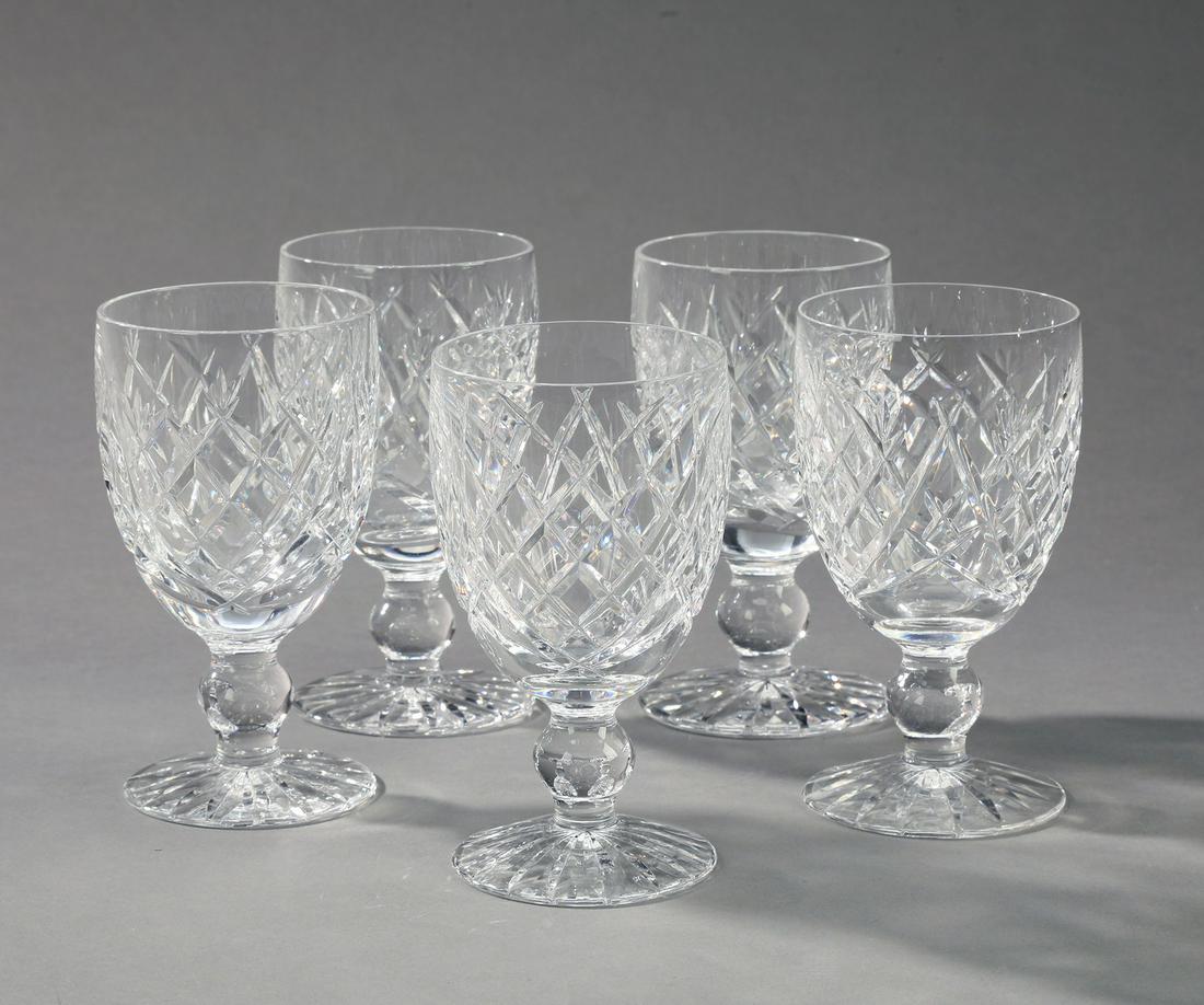 (5) Waterford Donegal pattern white wine glasses: Group of (5) Waterford 'Donegal' pattern white wine glasses, each having a lattice cut design and knop standard terminating to a cut foot, maker marked to underside, 4.5"h x 2.5"dia.
