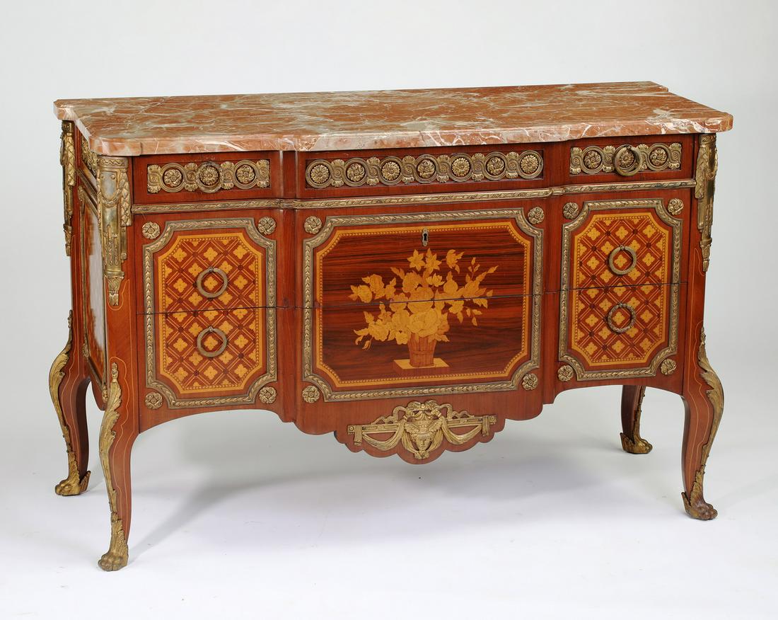 Napoleon III style marble top marquetry commode: Napoleon III style marble top marquetry inlaid commode, early 20th century, having a rouge marble surface rising on the conforming cabinet, accented with bronze rosettes, acanthus, and rinceaux mounts