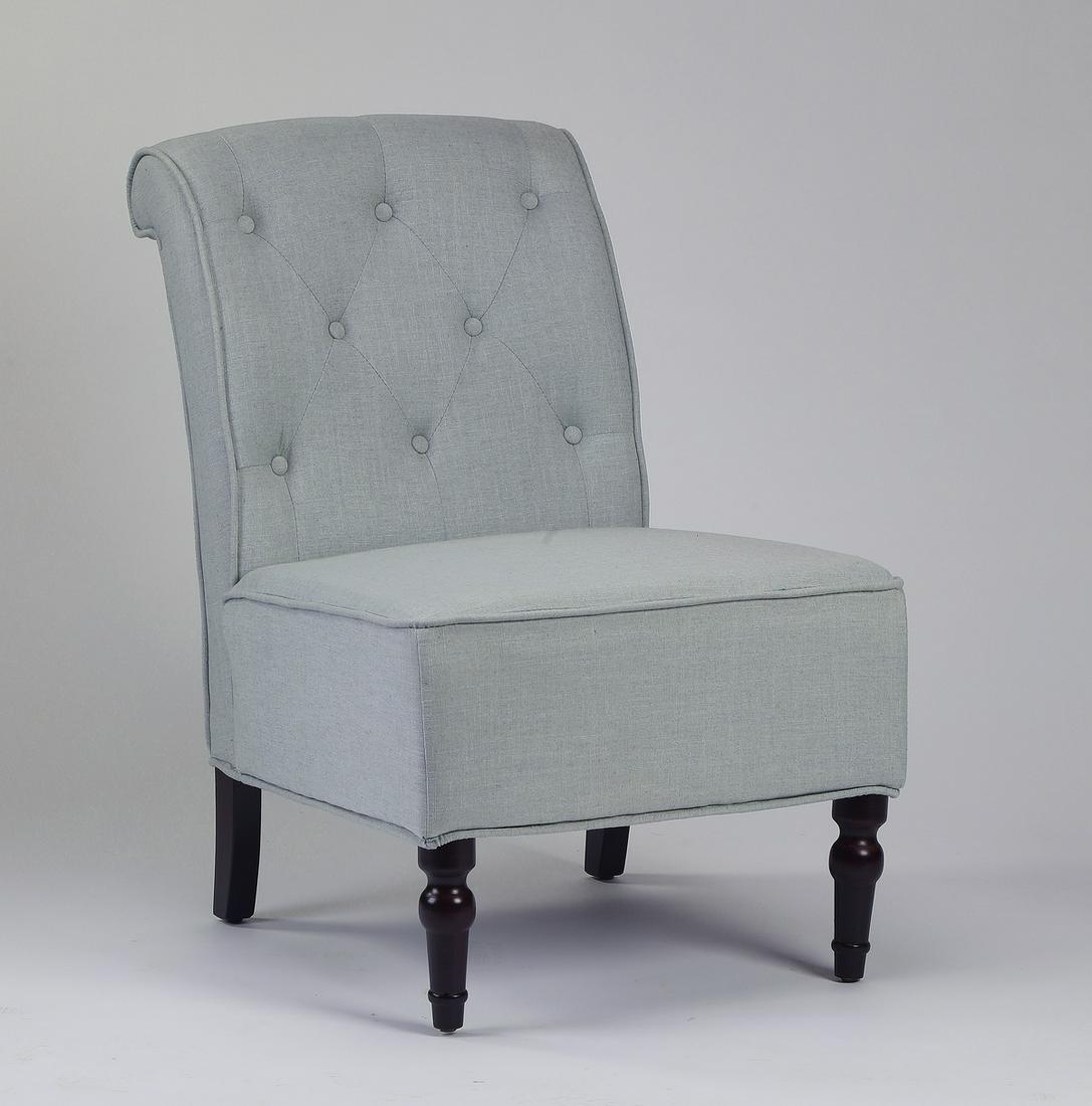 Button tufted slipper chair in the Regency taste: Upholstered slipper chair in the Regency taste, having a square button tufted back with rolled crest, over a square seat, the whole upholstered in robin egg blue and rising on inverted baluster legs t