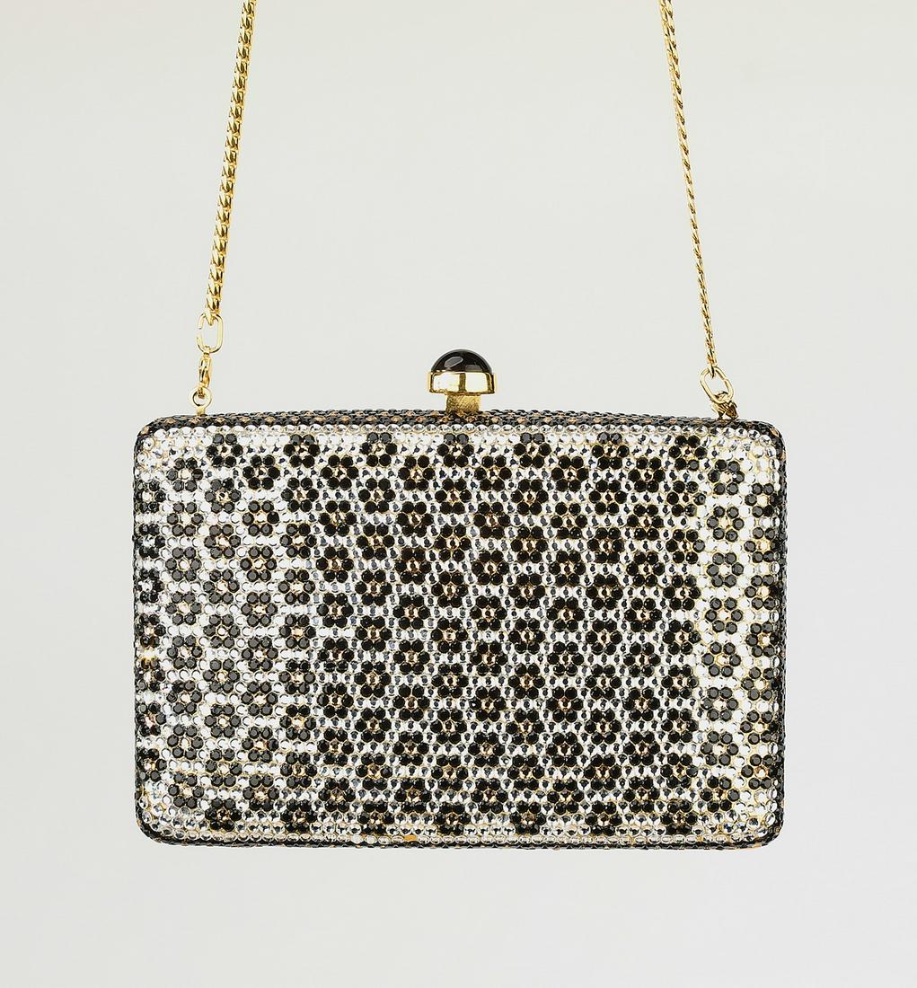 Authentic Bill Blass crystal floral evening bag: Authentic Bill Blass crystal evening bag, having an optional gold-tone shoulder chain and an all-over silver, gold, and black foliate design, the clasp closure opening to a single compartment, maker m