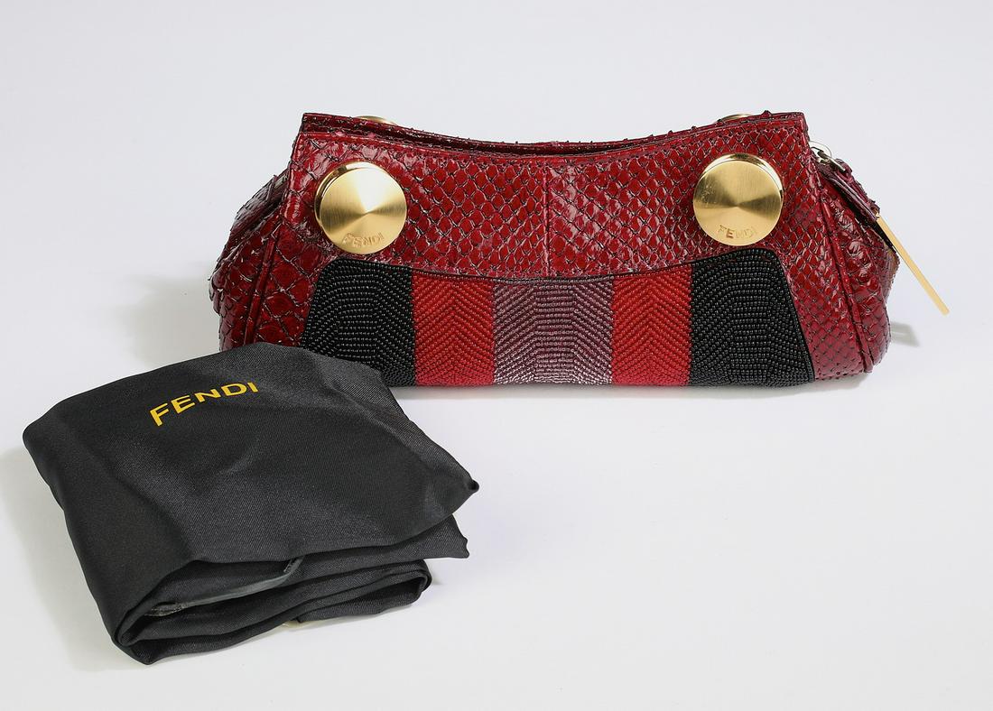 Authentic Fendi snakeskin and beaded clutch: Authentic Fendi snakeskin and beaded clutch, having gold-tone hardware and beaded accents in black, red, and purple stripes, the zipped closure opening to a single pocket, serial number 2372-8BP011-MB