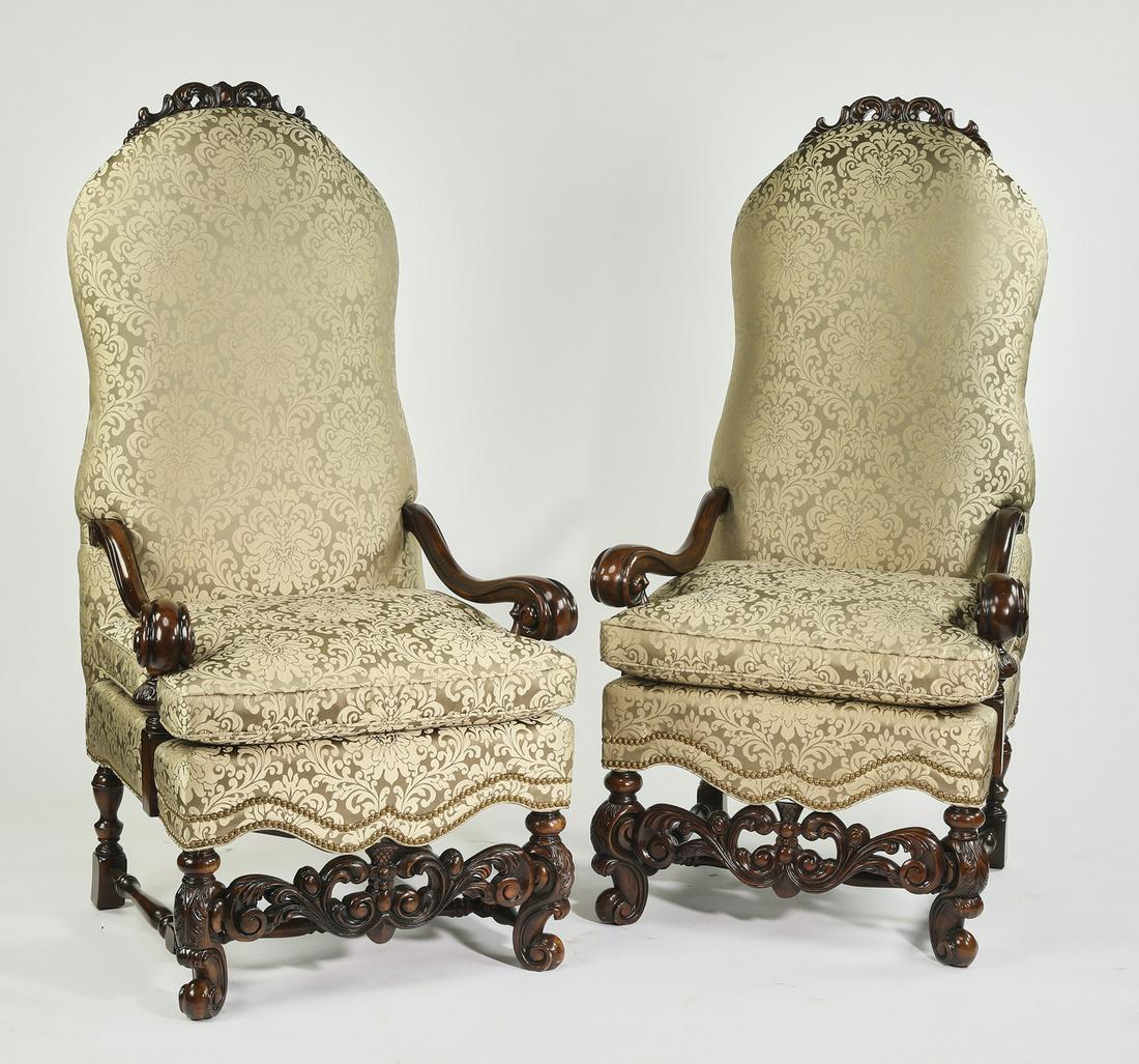 (2) Althorp Collection carved mahogany armchairs: Pair of Jacobean style mahogany armchairs, from the Althorp Collection by Theodore Alexander, each having a pierce-carved scrollwork crest above the seat upholstered in sage green tonal silk damask, l