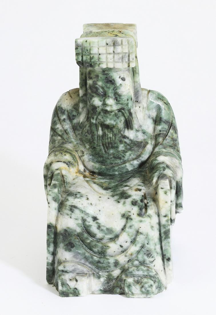 Chinese carved figure of the Jade Emperor, 6"h: Chinese carved stone figure of the Jade Emperor, depicted wearing elaborate robes and a fringed headdress, while seated on a throne, 6"h x 3.25"w x 3.75"d.
