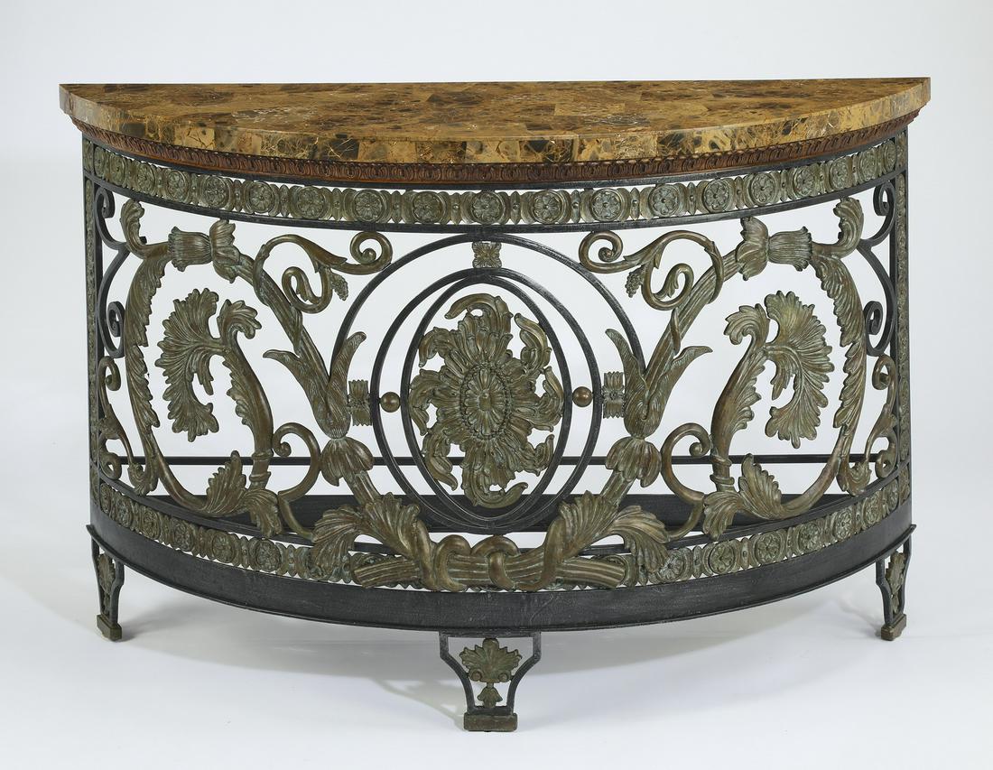 Maitland-Smith marble top demilune console table: Maitland-Smith demilune console table, having a tessellated marble surface rising on the wrought iron base, accented with foliates and acanthus scrollwork, maker marked to underside, 33.75"h x 53"w x