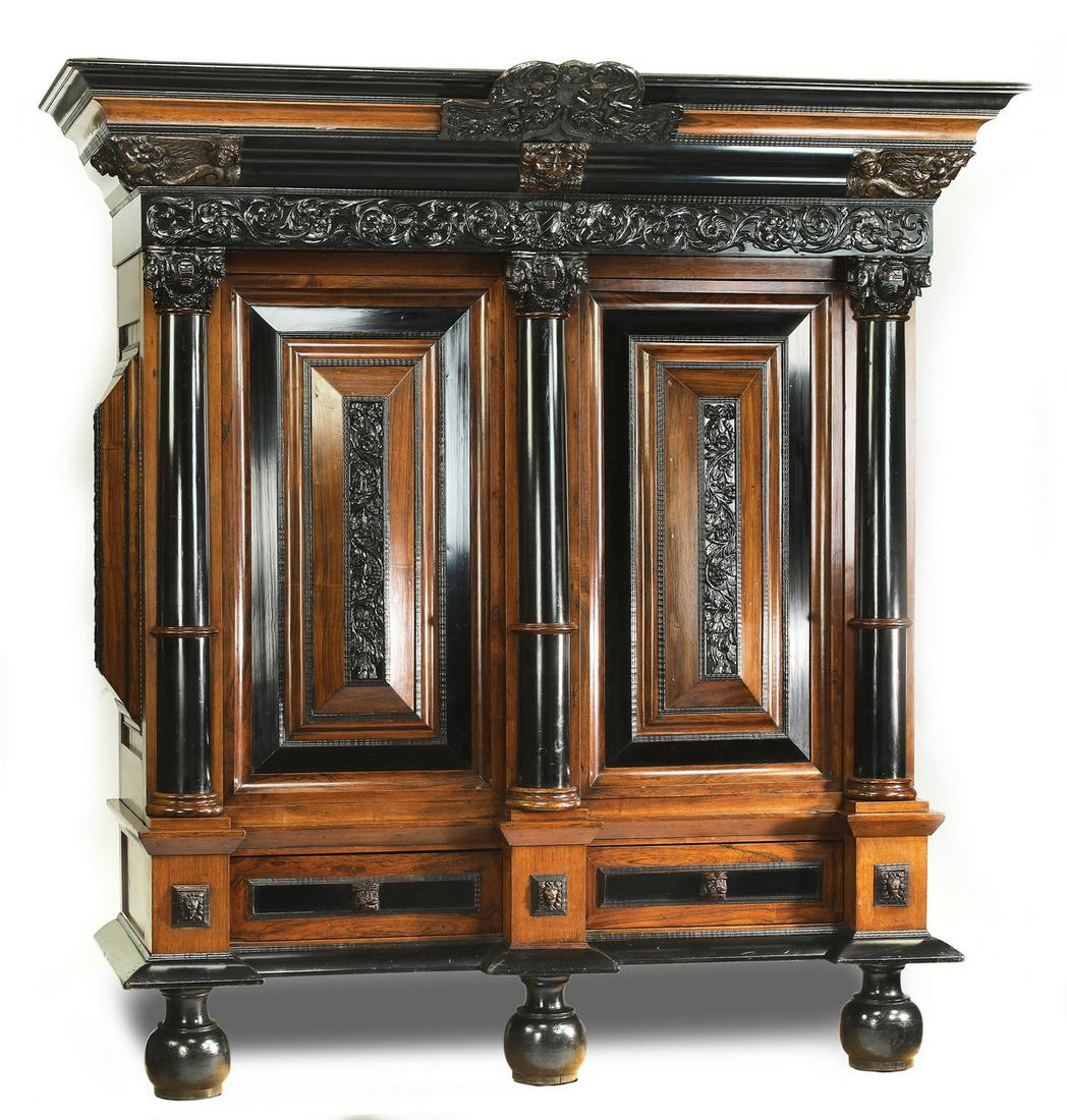 19th c. Dutch Baroque style Kass in rosewood: Dutch Baroque style 'Kussenkast' or Kass, 19th century, executed in rosewood and ebonized wood, having an oversailing cornice in alternating rosewood and ebonized wood, centering a carved panel depict