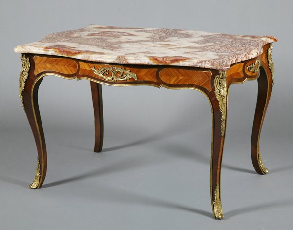 19th century rosewood center table: Mid 19th century Louis XV-style dore' bronze mounted rosewood center table with satinwood inlays and an exotic agate and onyx top, 31"h x 48"w x 35"d.