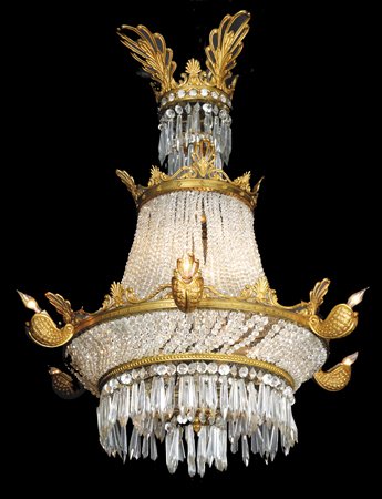 19th century bronze and crystal chandelier: Late 19th century finely chased dore' bronze teardrop shaped cut crystal chandelier with reticulated Neoclassical designs, 38"h x 26"w.