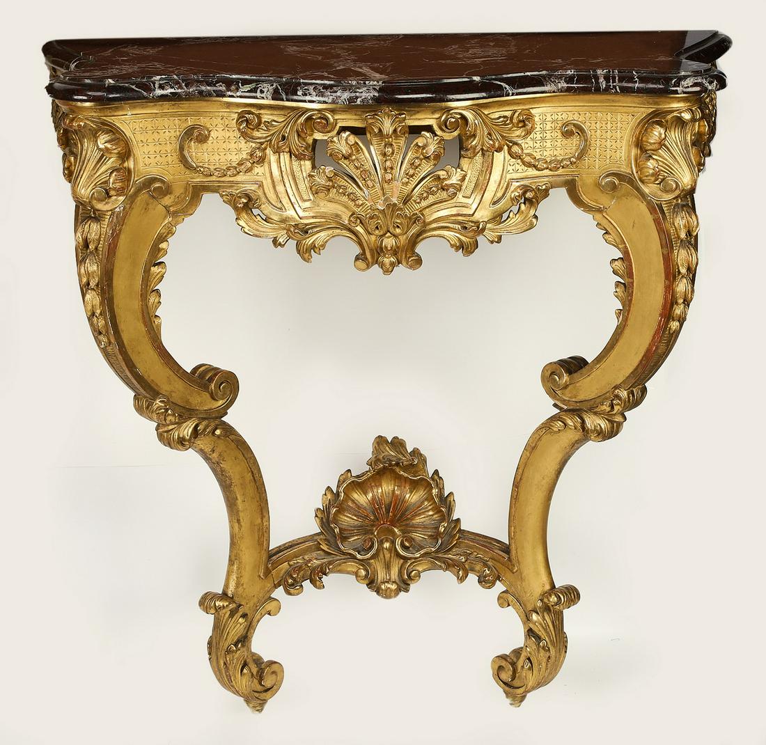 Wall mounted marble top giltwood console, 19th c. (1 of 2)