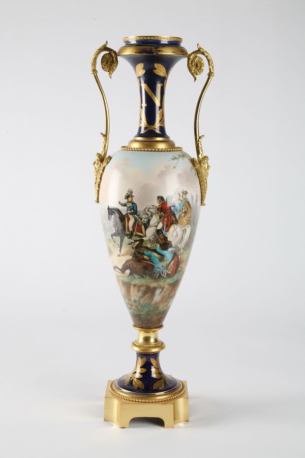19th c. porcelain vase, marked Royal Vienna: 19th century balluster form dore' bronze mounted Napoleon I commemorative vase, with a handpainted scene of Napolean in battle, marked Royal Vienna, 28"h x 10"w.