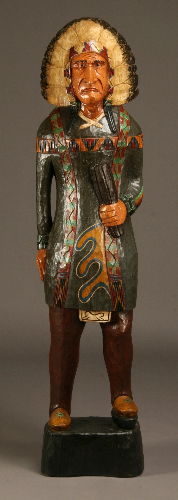 Carved cigar store Indian: Carved wood and polychrome decorated cigar store Indian, 73"h x 15"w at the base.