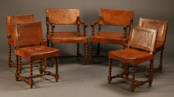 Set of six 19th c. Jacobean-style chairs: Set of six 19th century Jacobean-style chairs upholstered in leather with nailhead trim, supported by carved barley twist legs joined by a similarly carved H-shaped stretcher base, includes 2 arm chai