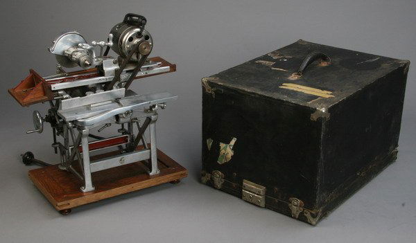 Rare salesman's sample with case: Rare early American traveling salesman's saw and planer with miniature electric motor, and original carrying case, machine 18"h x 13"w x 18"d.