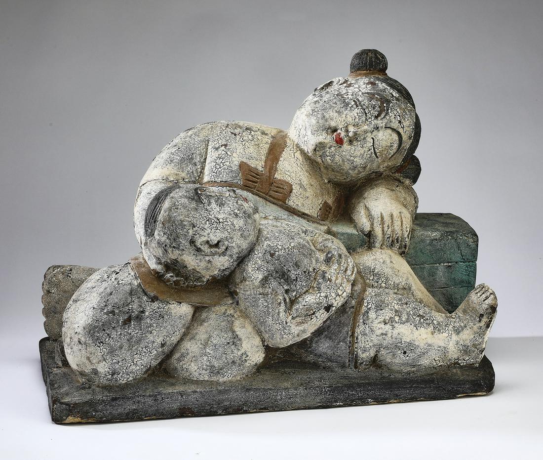 Chinese wood carving of two sleeping children (1 of 4)