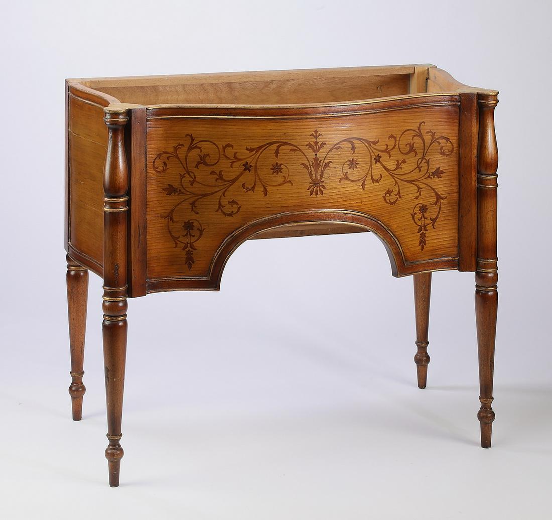Gilt-decorated marquetry vanity base: Gilt-decorated marquetry vanity base, 20th century, of serpentine form, having a marquetry inlaid apron depicting foliates and scrollwork, accented with gilt-decorated details, flanked by turned stile