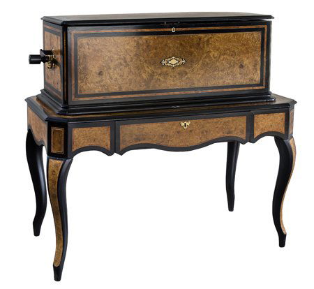19th century restored Swiss cylinder music box: Rare and unusual 19th century fully restored Swiss cylinder music box with orchestreon organ in a satinwood and ebonized case with brass and mother-of-pearl inlays on matching table-style stand. Stand