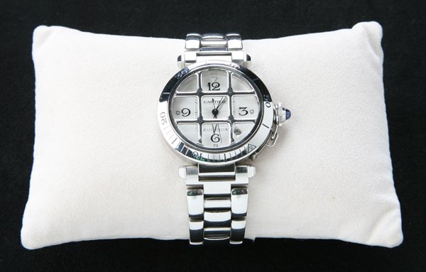Cartier Pasha stainless steel watch: Cartier Pasha stainless steel watch and matching deployable band, with unique "Tic-Tac-Toe" guard, and crystal see thru reverse, serial # 93771.