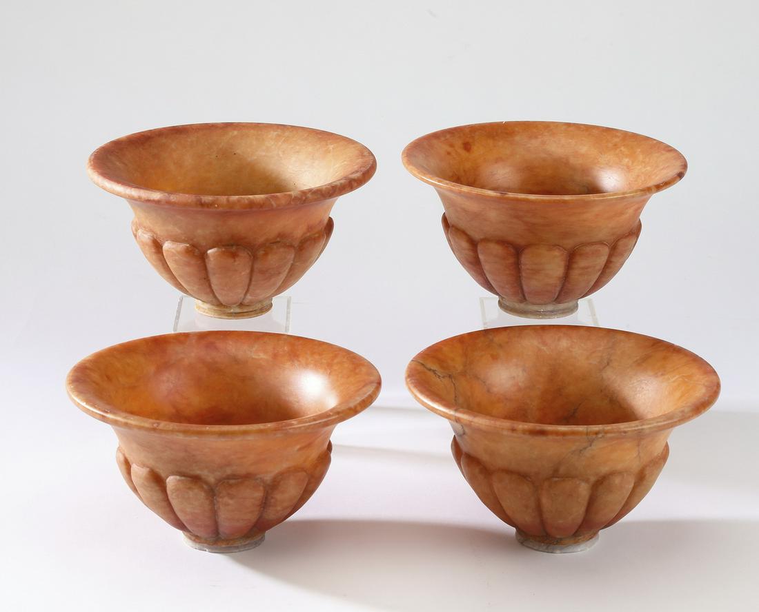 Group of (4) Continental carved alabaster shades: Group of (4) Continental alabaster shades, each with a lobed design and flared rim, having no apparent marks, 5"h x 8"dia.