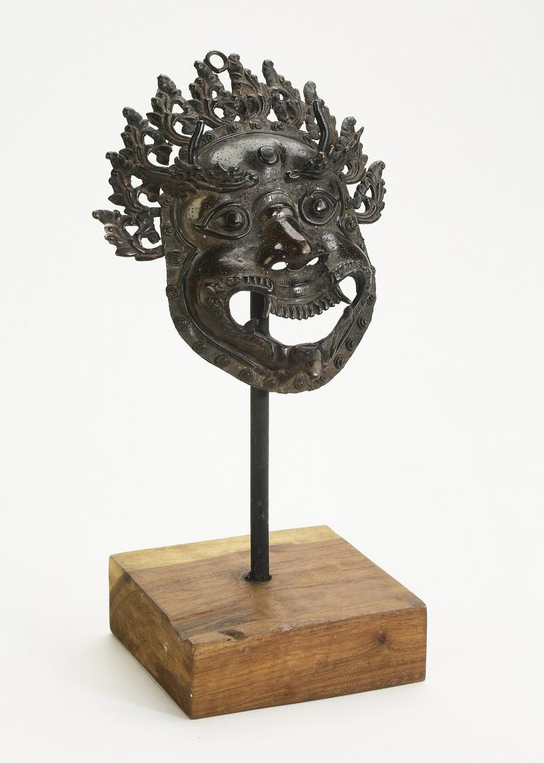 Nepalese metal mask of Mahakala w/ stand (1 of 3)