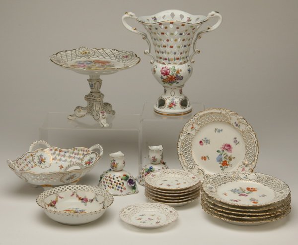 Dresden porcelain dessert service: 19 piece Dresden dessert service, with candle holders, double handled reticulated vase, cake stand, and bonbon dish. Vase 10"h, cake stand 7"h.