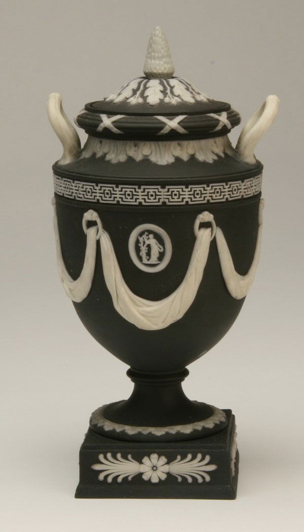 Wedgewood Jasperware lidded urn: Neoclassical-style Jasperware urn with lid, marked Wedgewood, 10" tall.